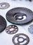 Close-up of Metal Gears, Washers on Light Background.