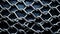 A close up of a metal mesh