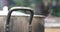 Close-up of a metal pot evaporating water, it is being boiled. Footage 4K