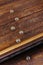 Close up metallic cat foot traces on wooden stair