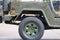 Close-up military jeep, travel battle concept.