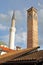 Close-up on the minaret of Gazi Husrev Begova Mosque and the Old Clock Tower, located in Bascarsija district