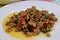 Close-up of minced pork stir-fried basil leaves, popular Thai food