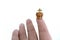 close up miniature metal gold, bronze crown on finger female hand, concept underestimation, supreme power, victory, triumph,