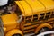 Close up miniature metal toy yellow school bus