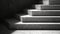 Close-up of minimalist architectural stairs with textured concrete surfaces illuminated by soft light