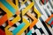 close-up of minimalist graffiti art, with repeating patterns and colors