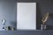 Close-up of mockup of white empty poster in grey flat interior w