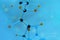 Close-up of model of molecular compounds, deoxyribonucleic acid on a blue blurred background, study of the human genome, concept