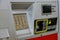 Close up of moment of payment by credit card into a reader on closeup modern fuel station at a gas station