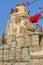 Close-up on monkeys Gray Langur sitting at the top of a Hindu temple located inside the fort Garh of Chittorgarh, Rajasthan, I