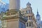 Close-up on the Monument to the great fire in London surrounded by modern buildings in the financial district of the City of Londo