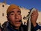 Close up of Moroccan snake charmer with snake