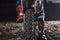 Close up of motocross wheel on the background of the track while driver sitting on the bike