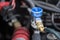 Close up motor car machine gas injector installing in gasoline e