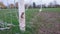 A close up of muddy football goal posts