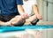 Close up mudra hand of two Asian young men sitting and practices yoga breathing meditation pose