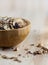 Close-up of Muesli and granola in blurred wooden background. (Shallow aperture intended for the aesthetic quality of the blur)