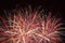 Close up of multicolor fireworks in night sky