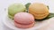 Close up of multicolor macarons , french macaroon, greedy pastry. French dessert sweets colored macaroons cookies