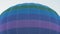 Close-up of a multicolored balloon rising into air