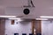 Close up Multimedia projector installed on the ceiling