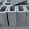 Close up of multiple grey cinder blocks on street