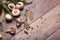 A close-up of mushrooms. Vegetable set on a wooden table background. Garlic, dry bay leaf and rosemary herbs. Copy space