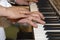 Close up of musician hands classic piano playing. Musician hands. Scene of pianist hands. Male musician playing midi keyboard