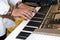 Close up of musician hands classic piano playing. Musician hands. Scene of pianist hands. Male musician playing midi keyboard