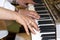 Close up of musician hands classic piano playing. Musician hands. Scene of pianist hands. Male musician playing midi keyboard