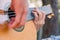 Close-up of the musician`s playing hands. The guitarist plays the guitar. Professional guitarist plays guitar outdoors. Musician