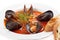 Close-up mussels with tomato sauce