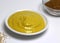 Close up of mustard in bowl on white background created using generative ai technology