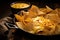 close-up of nacho chips and cheese in a skillet