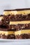A close up of Nanaimo bars - a traditional Canadian dessert