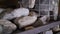 Close-up of natural gray rough stone for sauna. Can be used as a background. Stones in the sauna