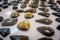 Close up of natural mineral stone - black obsidian gemstone from Mexico over a table inside of a souvenir store