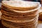 close-up of a neatly stacked pile of fresh tortillas