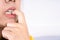 Close up nervous woman biting her nails, stressful woman gnawing her nails