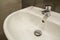 Close-up of new modern ceramic clean empty white washbasin sink