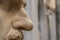Close-up nose of statue.