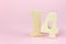 Close-Up Of Number 14 On pink Table. Valentines day concept. Calendar reminder event concept