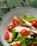Close up of nutritious salad with chicken fillet or breast, lettuce and Fresh tomatoes. Holiday or festive vitamin dish