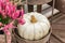 Close up og gray decorative pumpkin in metall basket. Harvest festival or farmers market
