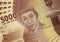 Close up on a old 5000 Rupiah banknote. A fan of Indonesian banknotes