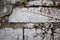 Close up of old brick wall at a former prison in Asia sloppily p