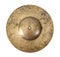 Close up of an old cymbal on isolated background. Brass cymbal isolated