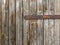 Close-up of old decayed brown wooden fence