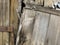 Close-up of old decayed brown wooden fence